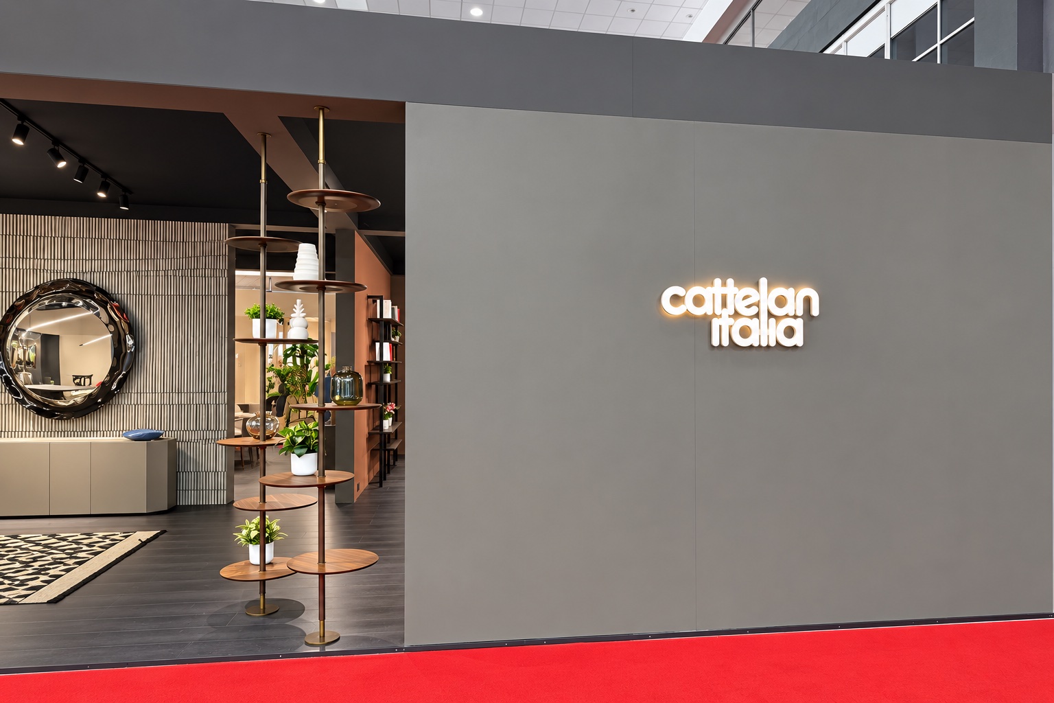 Parete con insegna luminosa Cattelan Italia nello stand Avellino Elisa